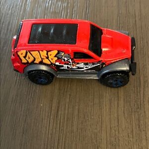 Vibrant Red Graffiti Toy SUV